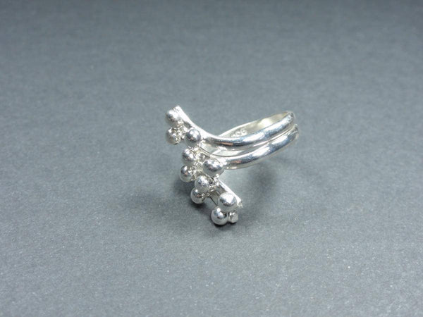 Bague argent spirale et boules.